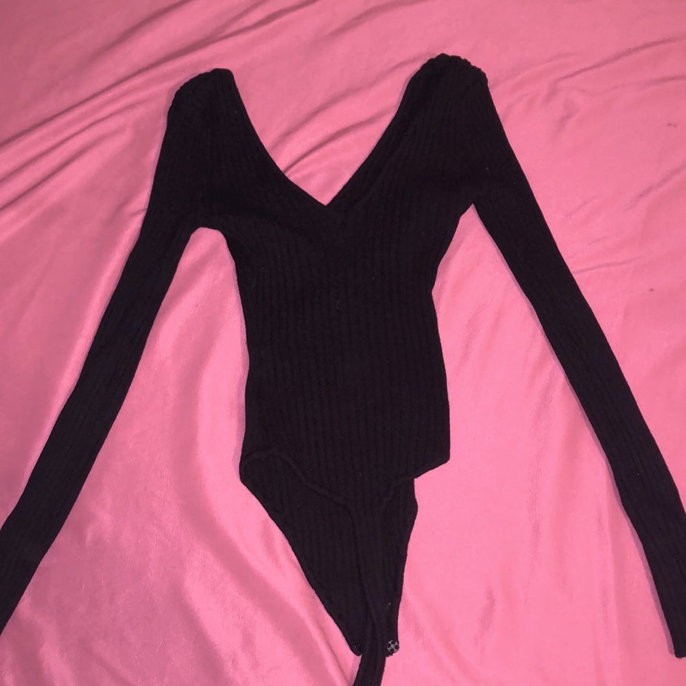 It’s a black bodysuit and very stretchy.